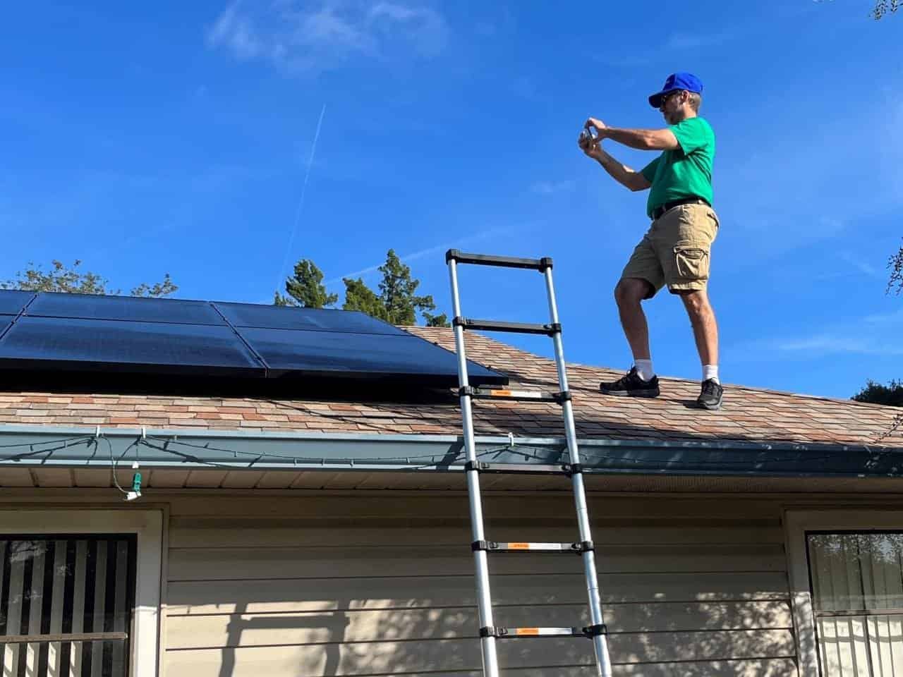 Kevin on roof taking pictures